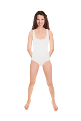 Full length portrait of a beautiful cheerful woman wearing a white bodysuit, studio photo isolated in front of white background