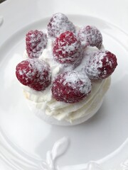 Anna Pavlova cake with cream and berries 