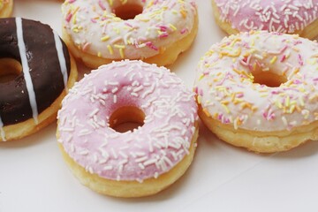 Fresh doughnuts with cream and chocolate macro
