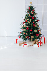 Christmas tree pine with gifts for the new year interior postcard banner