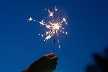 hand holding sparkler