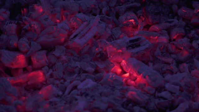 Red-hot charcoal gives off intense heat. High combustion