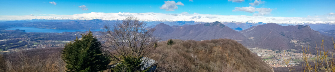 Obraz premium wide angle view of the province of Varese and the Alps from Mount Campo dei Fiori