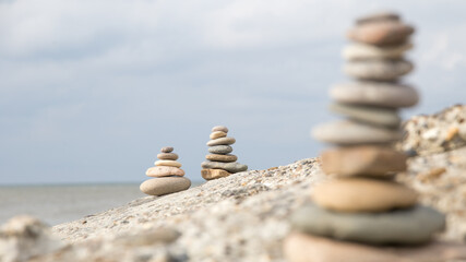 Fototapeta na wymiar The balanced stones at the beach