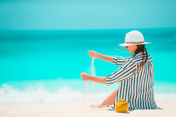 Fototapeta na wymiar Young beautiful woman on beach tropical vacation