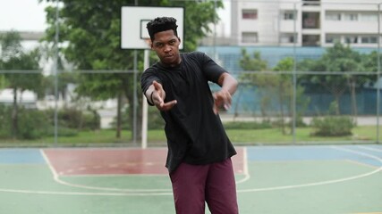 Black African man performing urban dance freestyle krump