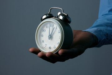 Leaving concept, clock breaks into pieces