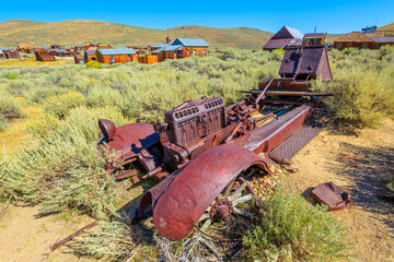 Fototapeta premium Rusty wreck of the vintage old car, in Bodie state historic park, Californian Ghost Town. The United States of America.