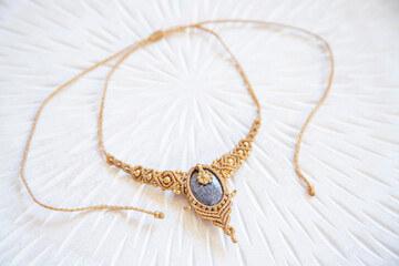 Macrame technique waxed string necklace with gemstone lapis lazuli