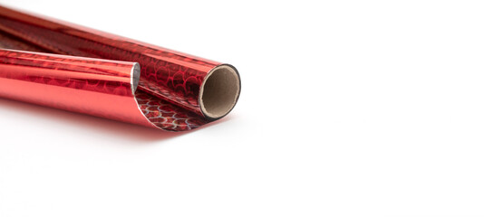 Red glitter wrapping paper for new year and birthday gifts. On a white isolated background.