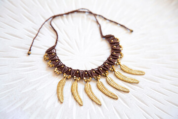 Macrame technique waxed string necklace with brass components