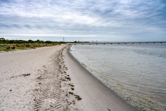 An awesome beach close to the city center of Malmo, Sweden. Blue sky and patchy clouds in the background