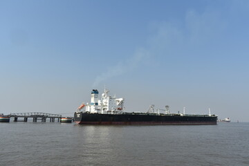 A large empty merchant ship waiting in mumbai port
