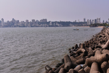 Mumbai marine drive captured from close with big rocks