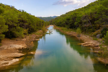 Fototapeta na wymiar noramic view of the Pena river before going out into the swamp of the same name. Beceit, Matarranya, Aragon, Spain