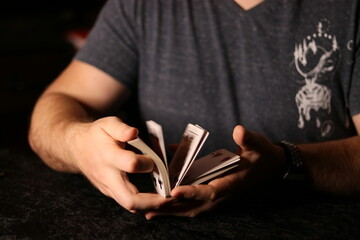 card magician pracard magician practicing sleight of hand magic Cardestrycticing sleight of hand magic