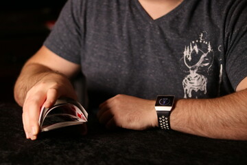 card magician practicing sleight of hand magic