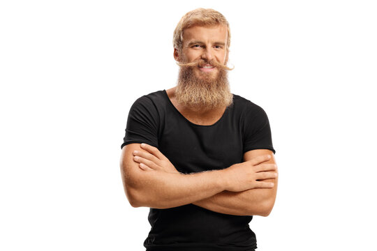 Bearded man with mostaches smiling and posing with crossed arms