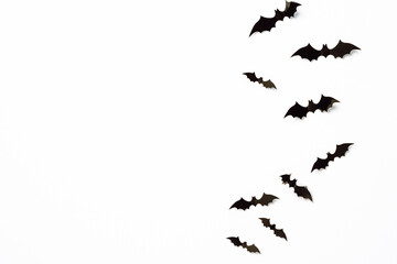 Flying bats group isolated on white background.  Halloween symbols.