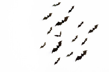 Flying bats group isolated on white background.  Halloween symbols.