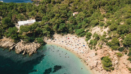 Crowded spanish beach in Ibiza, Balearic Islands, Spain