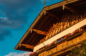 Fototapeta na wymiar Beautiful sunset with details of a boat house at Rottach-Egern, Tegernsee, Bavaria, Germany