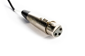 macro closeup of a  male XLR audio microphone plug