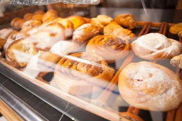 Delicious cinnabons on the display for sale at the bakery