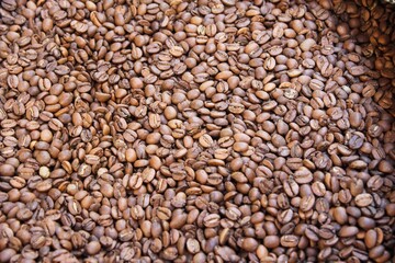 Raw coffee beans in sacks, coffee shop in Athens, Greece.