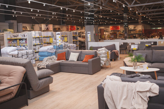 Furniture store with sofas and couches on display for sale, copy space