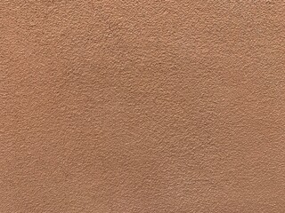 Fototapeta premium Abstract dark brown cement wall background with space for text. Blank background ideas.