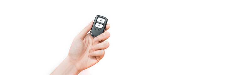 web banner new wireless car key in beauty woman hand with white background