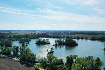 Naklejka na ściany i meble Aerial view of a lake in the village of Komjatice in Slovakia