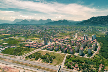 Obraz premium Aerial top view photo of modern building site next to the highway