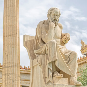 Socrates the ancient Greek philosopher sitting in deep thoughts staue, Athens Greece