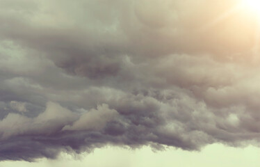 Fototapeta na wymiar gloomy Cumulus clouds in the summer sky