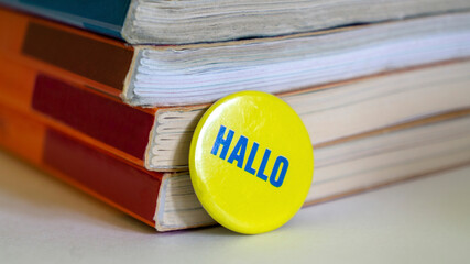 Stack of books and yellow round icon with space for your text. A bunch of books 