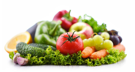 Composition with fresh vegetables and fruits isolated on white