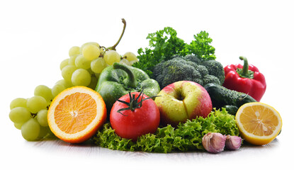 Composition with fresh vegetables and fruits isolated on white