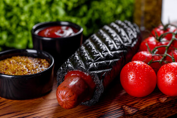 Delicious fresh hot hotdogs with various kinds of buns and sausages.