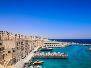 Egypt, Hurghada- AUGUST 28th 2020 Crystal clear azure water - resort with white beach - paradise...