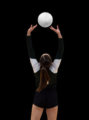 Young girl playing in a competitive volleyball match