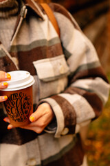 Autumn girl with coffee at outdoor 