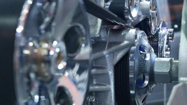 Inside view of engine, close up detail of two pistons in cylinder,some gears aside.