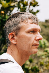 Mature man portrait in forest