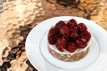 Raspberry tart on table. Autumn dessert.