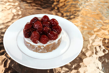 Raspberry tart on table. Autumn dessert.