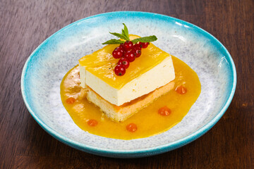 Traditional Cheesecake with orange sauce