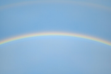 rainbow on the blue sky