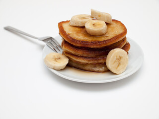 Banana pancakes with maple syrup